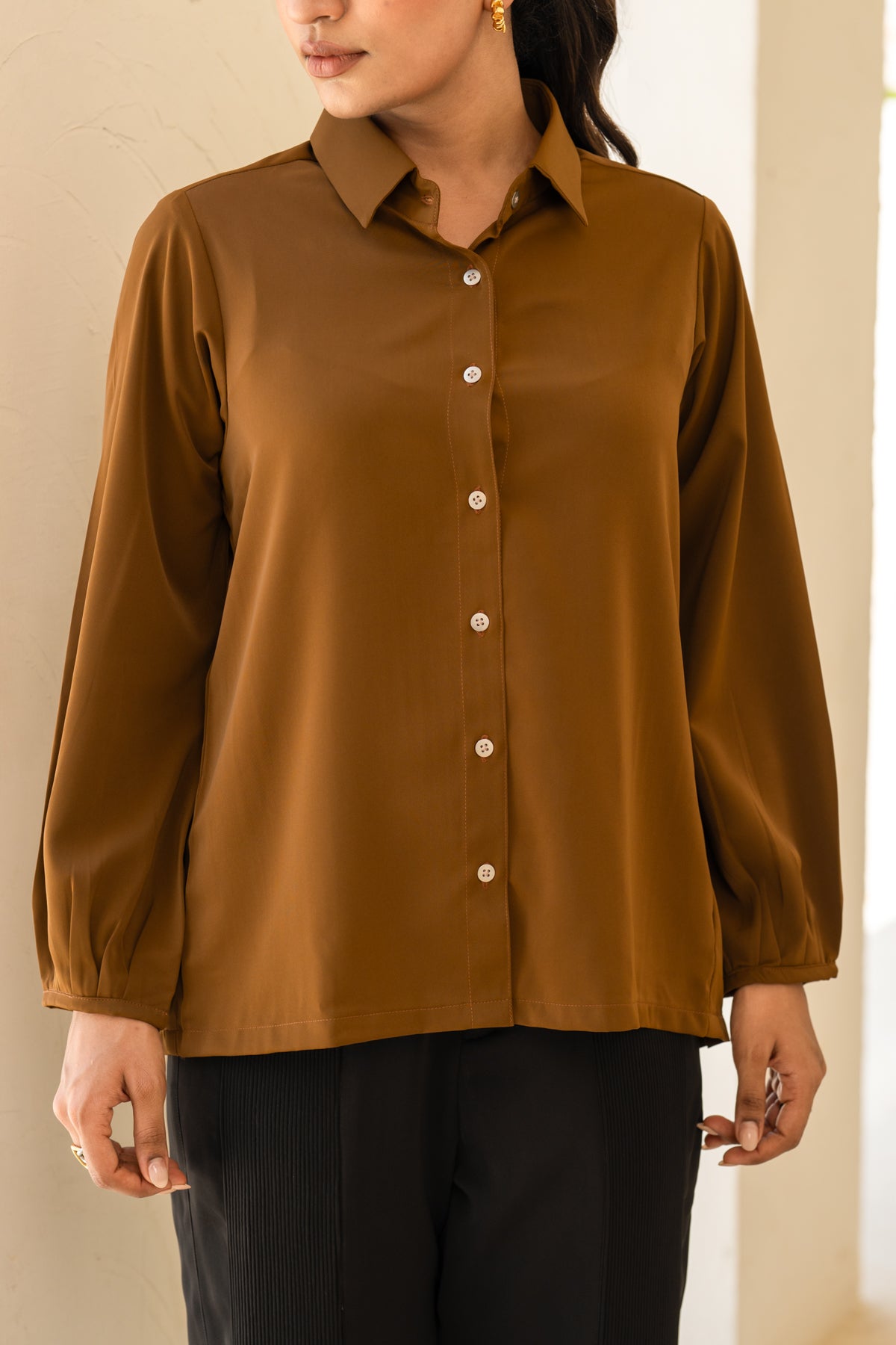 THE PLEAT-BACK SHIRT